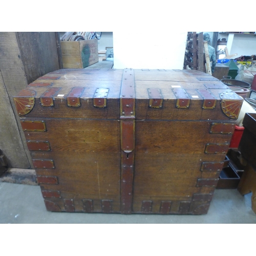 275 - A Victorian oak and metal bound silver chest