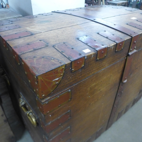 275 - A Victorian oak and metal bound silver chest