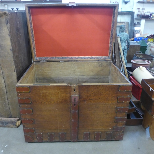 275 - A Victorian oak and metal bound silver chest