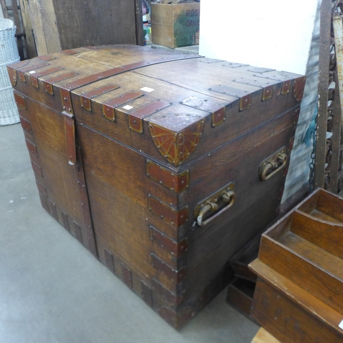 275 - A Victorian oak and metal bound silver chest