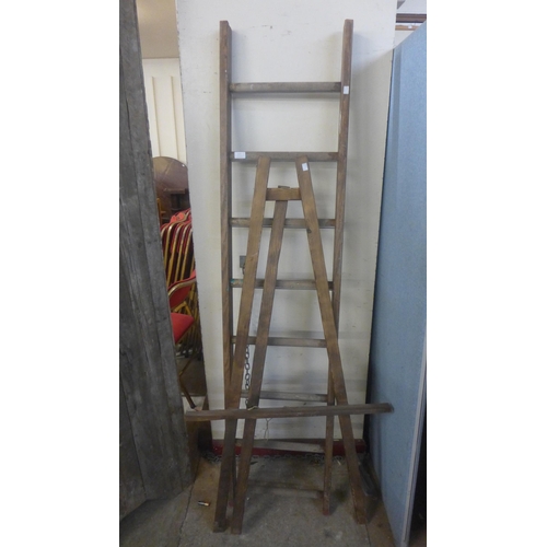 277 - A pine artist's easel and a ladder