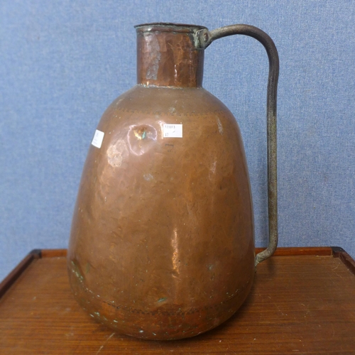 295 - A Victorian copper jug