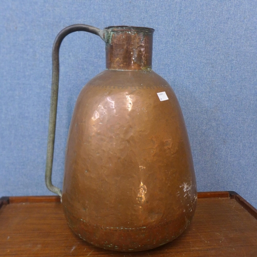 295 - A Victorian copper jug