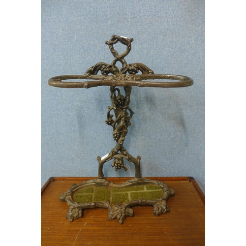 297 - A Victorian style cast iron stick stand, manner of Coalbrookdale