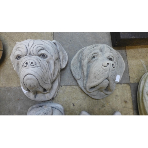 300 - Three concrete dogs and a figure