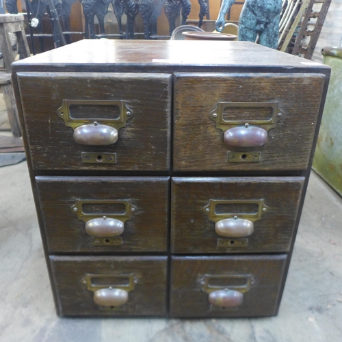 313 - An early 20th Century oak six drawer table top index drawer chest