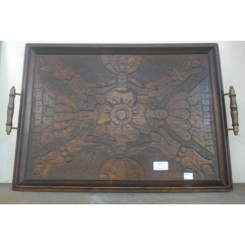 364 - An early 20th Century carved oak serving tray