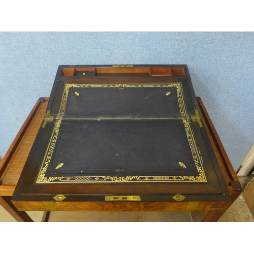 366 - A Victorian walnut and brass bounded writing slope