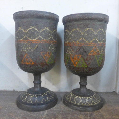 377 - A pair of Eastern enamelled brass vases