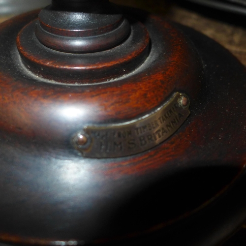 380 - A pair of oak bobbin turned candlesticks, labelled; Made from timber taken from HMS Britannia and tw... 