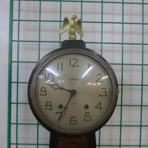 382 - An early 20th Century Gilbert 8-day mahogany wall clock