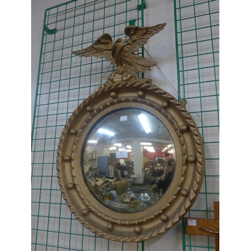 386 - A Regency style gilt framed convex mirror