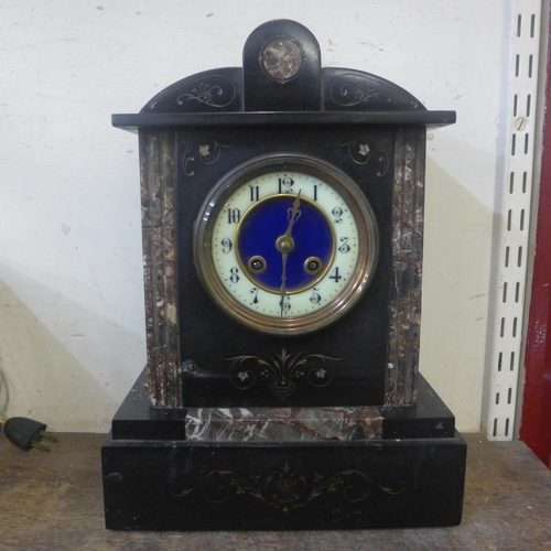 392 - A 19th Century French Belge noir mantel clock