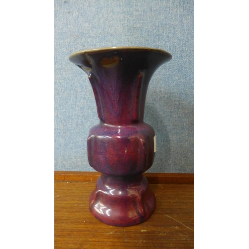 395 - A purple glazed studio pottery vase