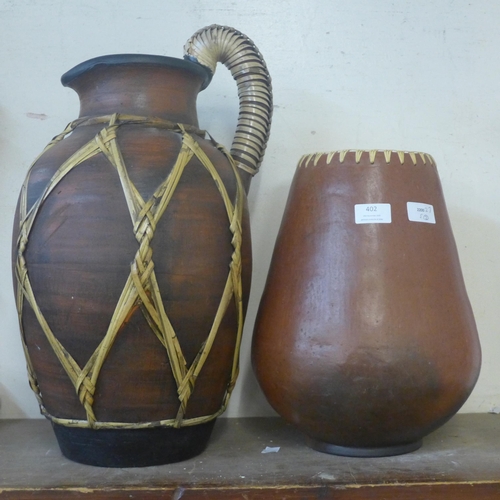 402 - Two African pottery vases