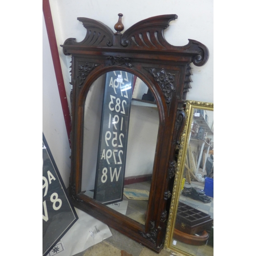 411 - A 19th Century French carved mahogany pier mirror