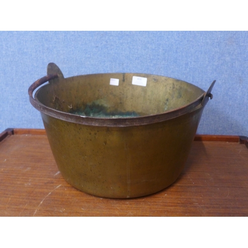 416 - A Victorian brass jam pan