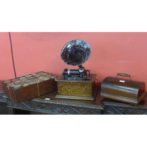 432 - An oak cased Edison Standard Phonograph, with metal speaker horn and various wax cylinders