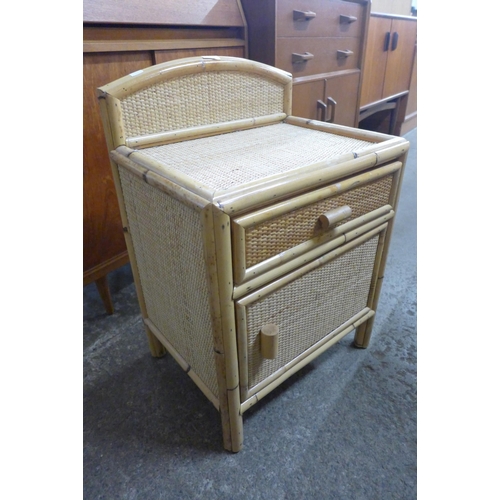 67 - A G-Plan teak stool and a bamboo and rattan bedside table
