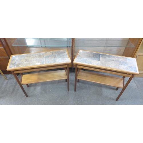 73 - A pair of Danish teak and tiled top coffee tables
