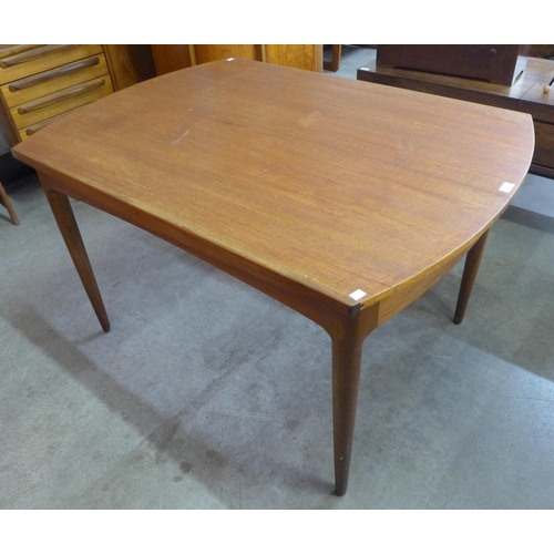 8 - A Greaves & Thomas teak extending dining table