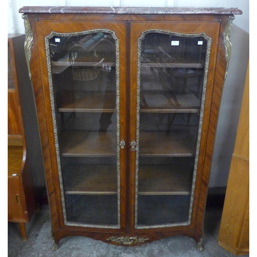 91 - A 19th Century French rosewood, gilt metal and marble topped two door vitrine