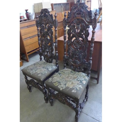 94 - A pair of Charles II style carved walnut side chairs