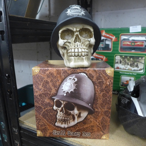 2119 - Six Policeman skull money boxes