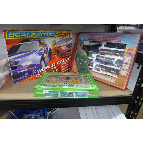 2132 - A Scalextric World Rally, Subbuteo and a traditional railway set