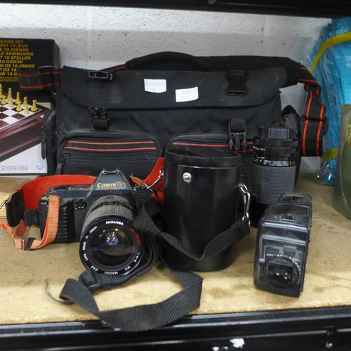 2137 - A Canon camera and lenses in carry case