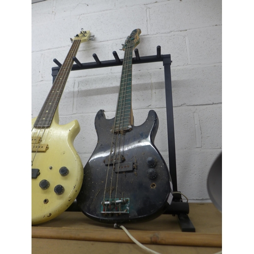 2144 - Two electric bass guitars