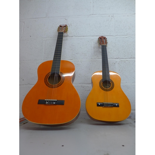 2145 - Two acoustic guitars; Martinez and Palma