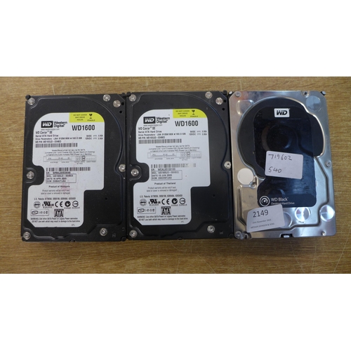 2149 - Two Western Digital Caviar SE WD1600 160GB serial Ata desktop hard drives and a WD black desktop har... 