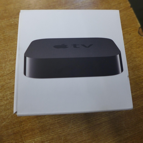 2158 - A boxed high definitiion 1080p Apple TV set complete with cable and remote and one other Apple TV se... 