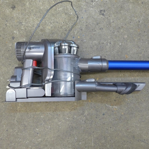 2172 - Dyson DC44 vacuum cleaner with tools, wall bracket and charger