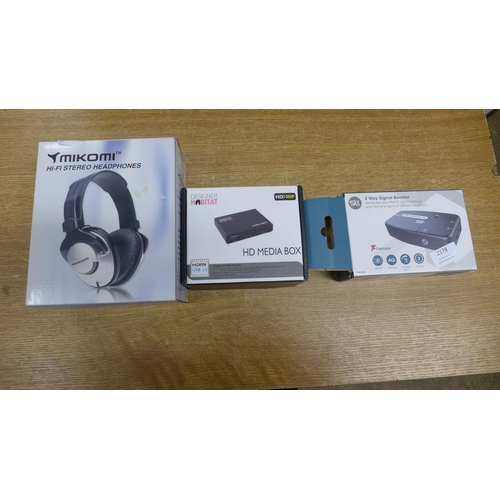 2178 - A pair of headphones, a media box and a single booster