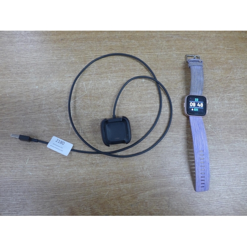 2180 - A Fitbit and charger