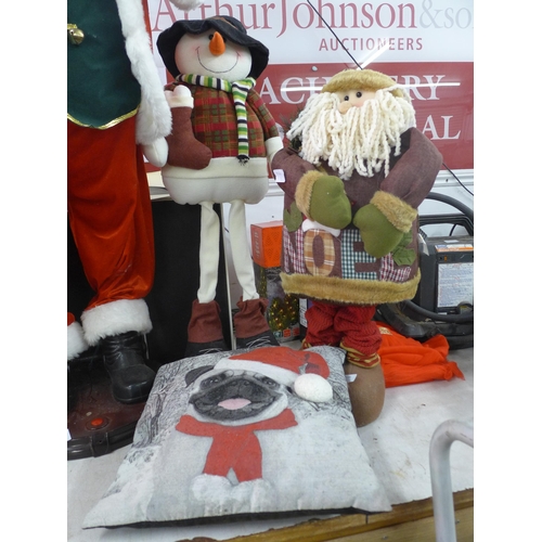 2196 - A quantity of Christmas items; a Snowman and Old Santa and a Pug Christmas cushion