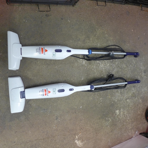 2205 - Two Bissell featherweight bagless floor cleaners