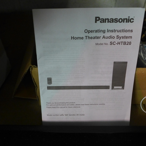 2245 - A Panasonic SCHTB20 Home Theatre audio system with operating instructions and remote