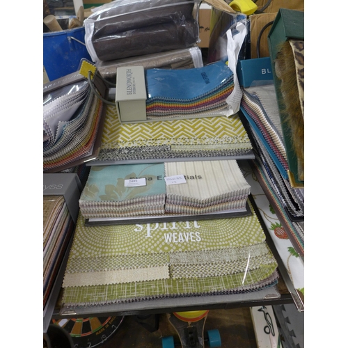 2485 - A quantity of carpet and fabric sample books