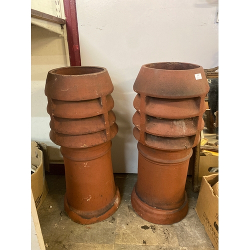 291 - A pair of terracotta chimney pots