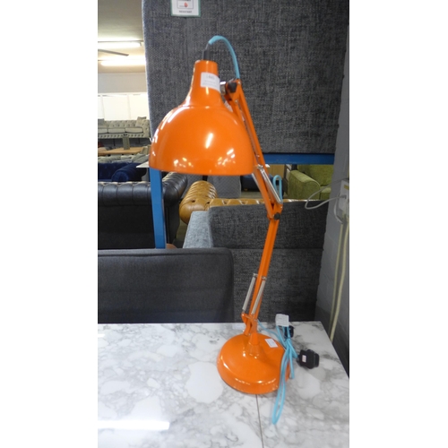 1445 - An orange anglepoise lamp
