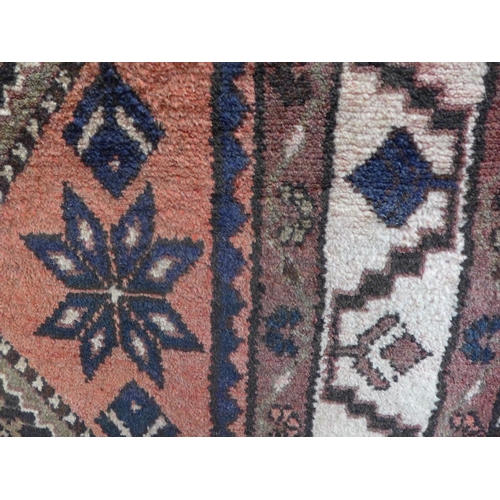 1509 - A washed red ground full pile Persian hamadan runner, 295cm x 107cm