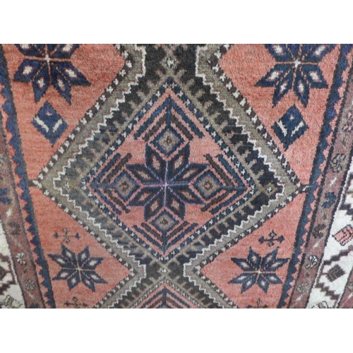 1509 - A washed red ground full pile Persian hamadan runner, 295cm x 107cm