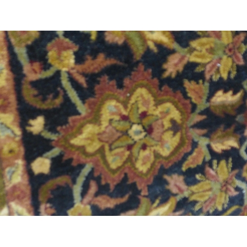 1547 - A 100% wool pile, Indian Agra rug, 8ft x 5ft