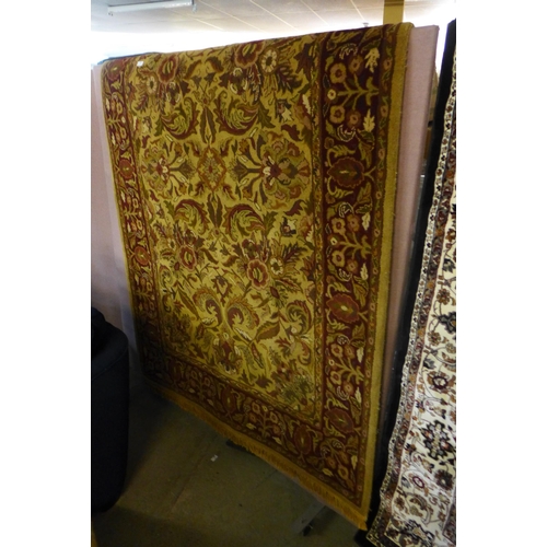 1552 - A 100% wool pile, gold ground Indian Agra rug, 8ft x 5ft