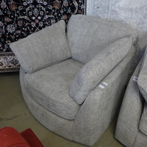 1554 - A Barker & Stonehouse oatmeal hopsack swivel armchair