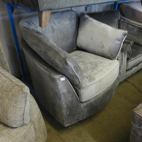 1558 - A Barker & Stonehouse pewter upholstered swivel armchair