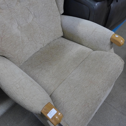 1578 - A beige upholstered electric reclining armchair